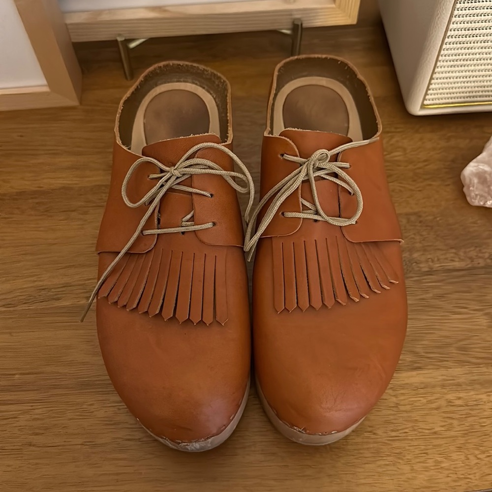 Bryr Tan Leather Mules with Fringe Detail